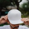 Man In Blank White Cap